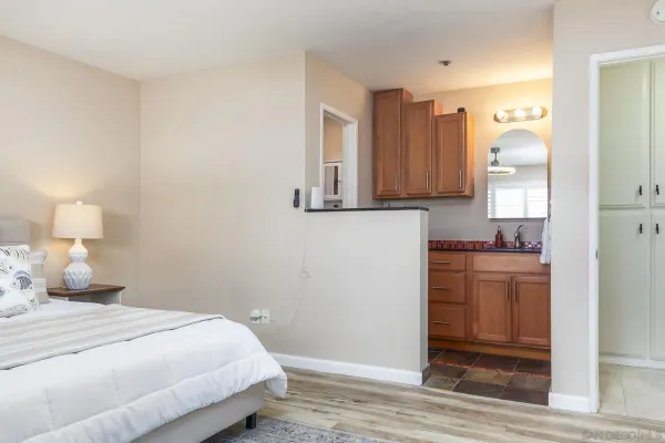 a bathroom with a shower and toilet