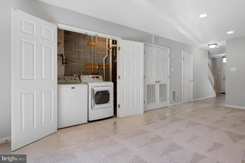 a view of empty room with windows