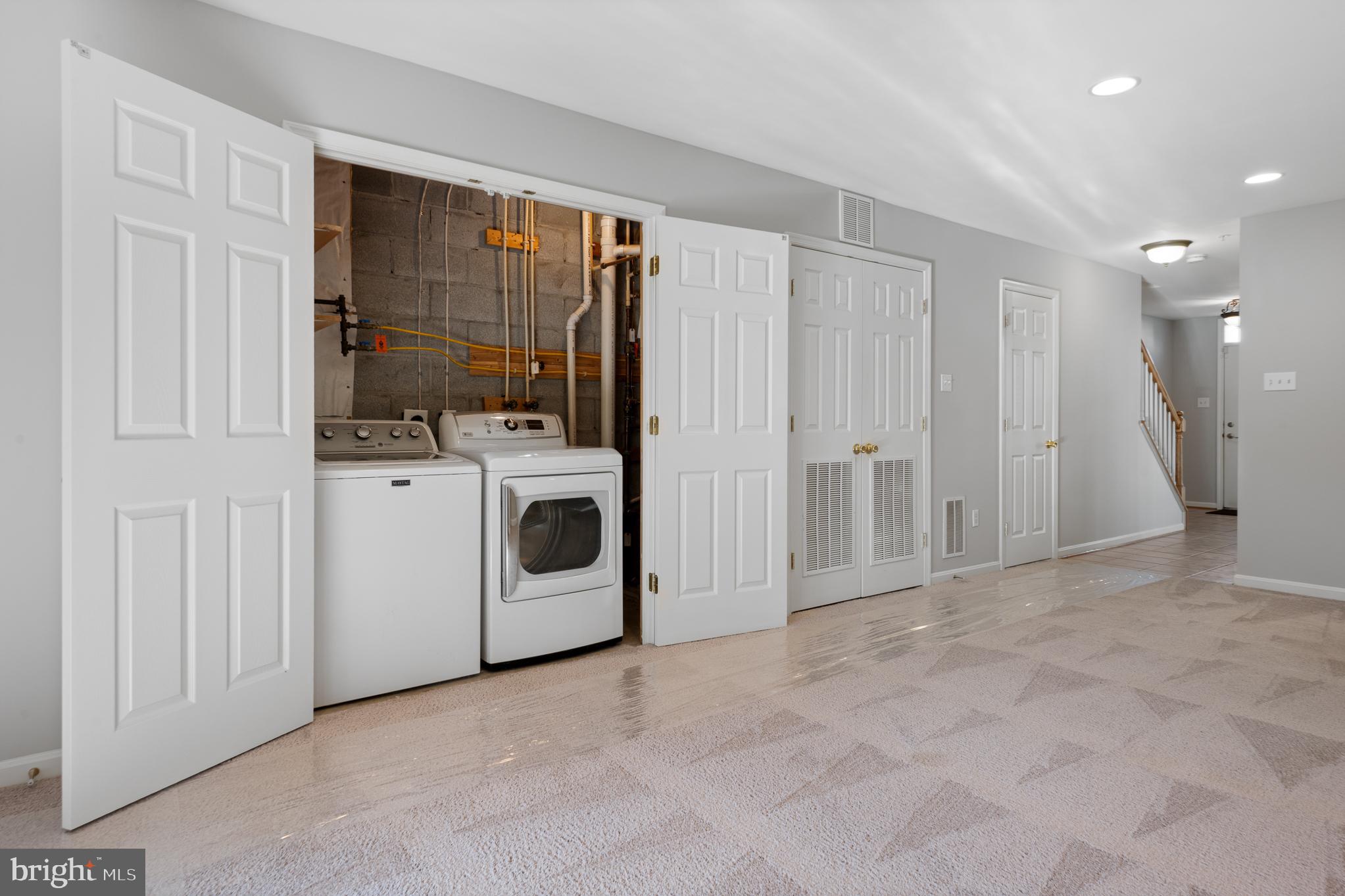 511 Ellison Court Frederick, MD 21703 - Photo 12 of 79 a view of a storage & utility room with washer and dryer