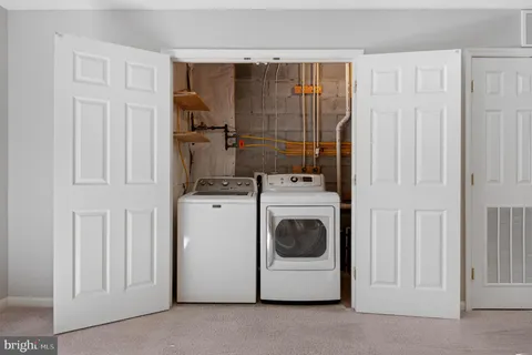 a kitchen with a sink and a window