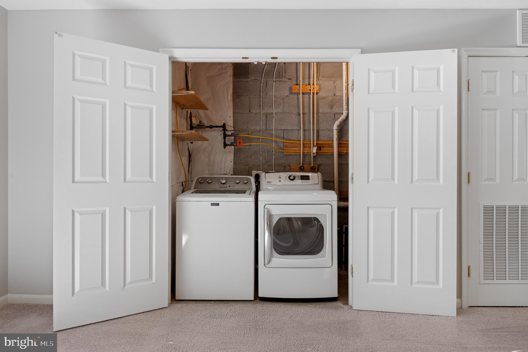 511 Ellison Court Frederick, MD 21703 - Photo 14 of 79 a utility room with dryer and washer