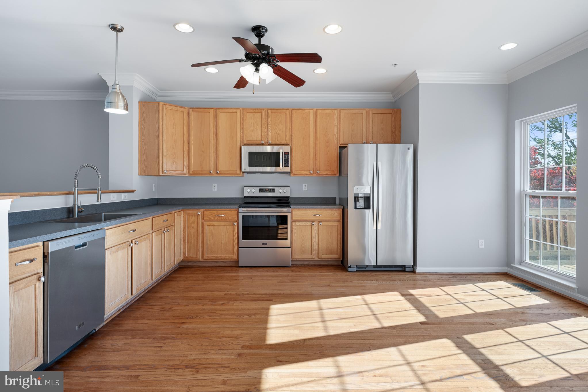 511 Ellison Court Frederick, MD 21703 - Photo 17 of 79 a large kitchen with cabinets and stainless steel appliances