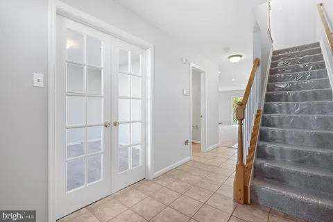 a view of entryway with stairs