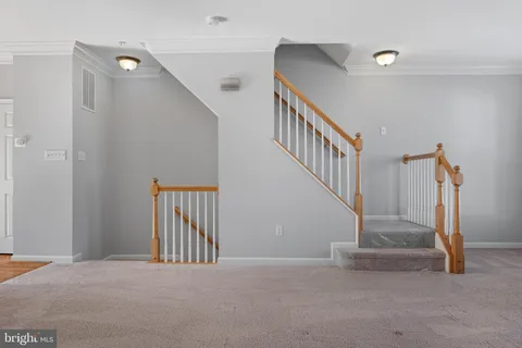 a white bath tub sitting next to a white sink