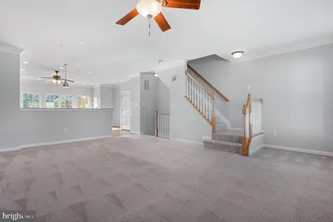 a bathroom with a toilet a sink and a mirror