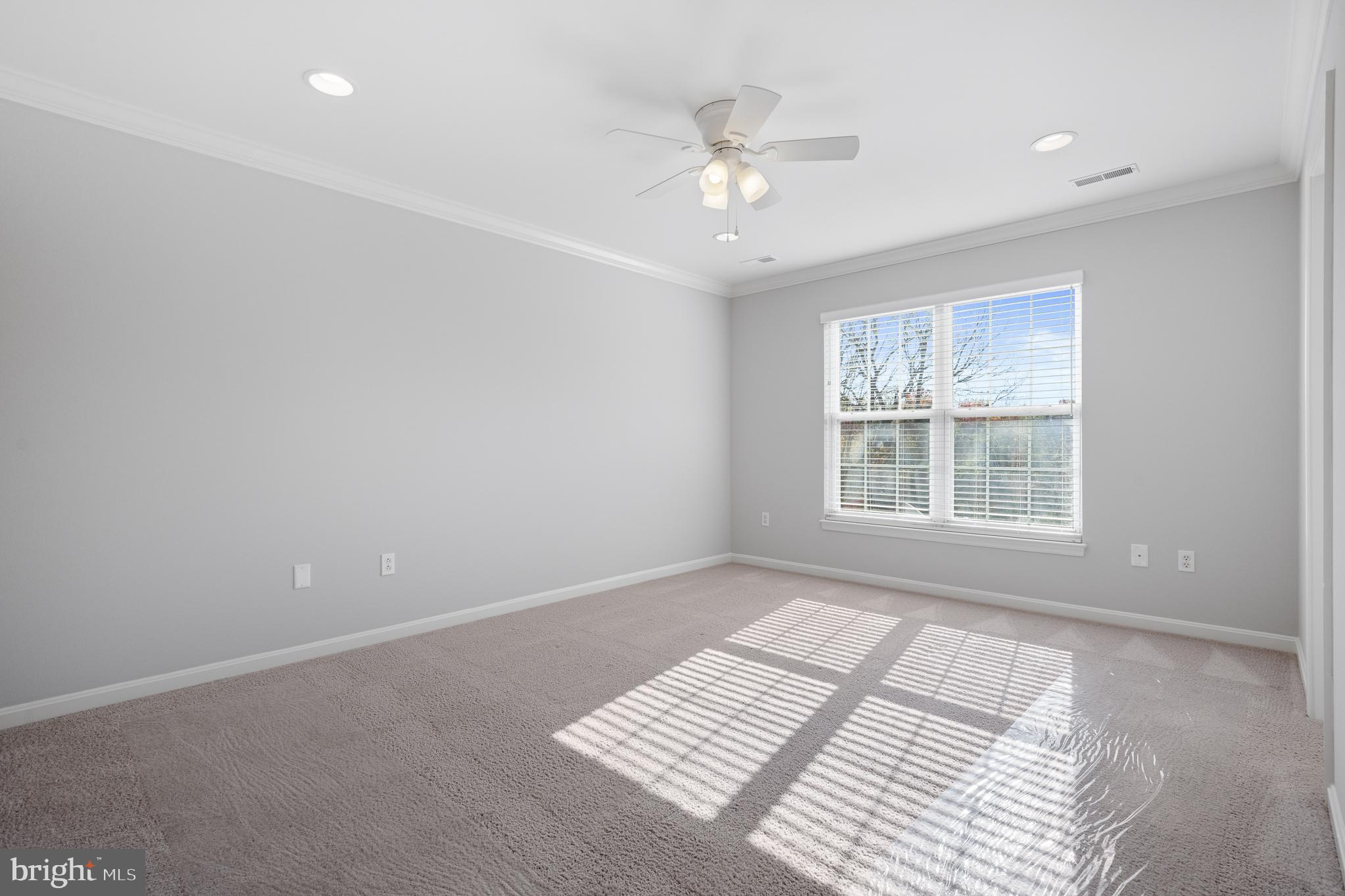511 Ellison Court Frederick, MD 21703 - Photo 40 of 79 a view of an empty room with a window