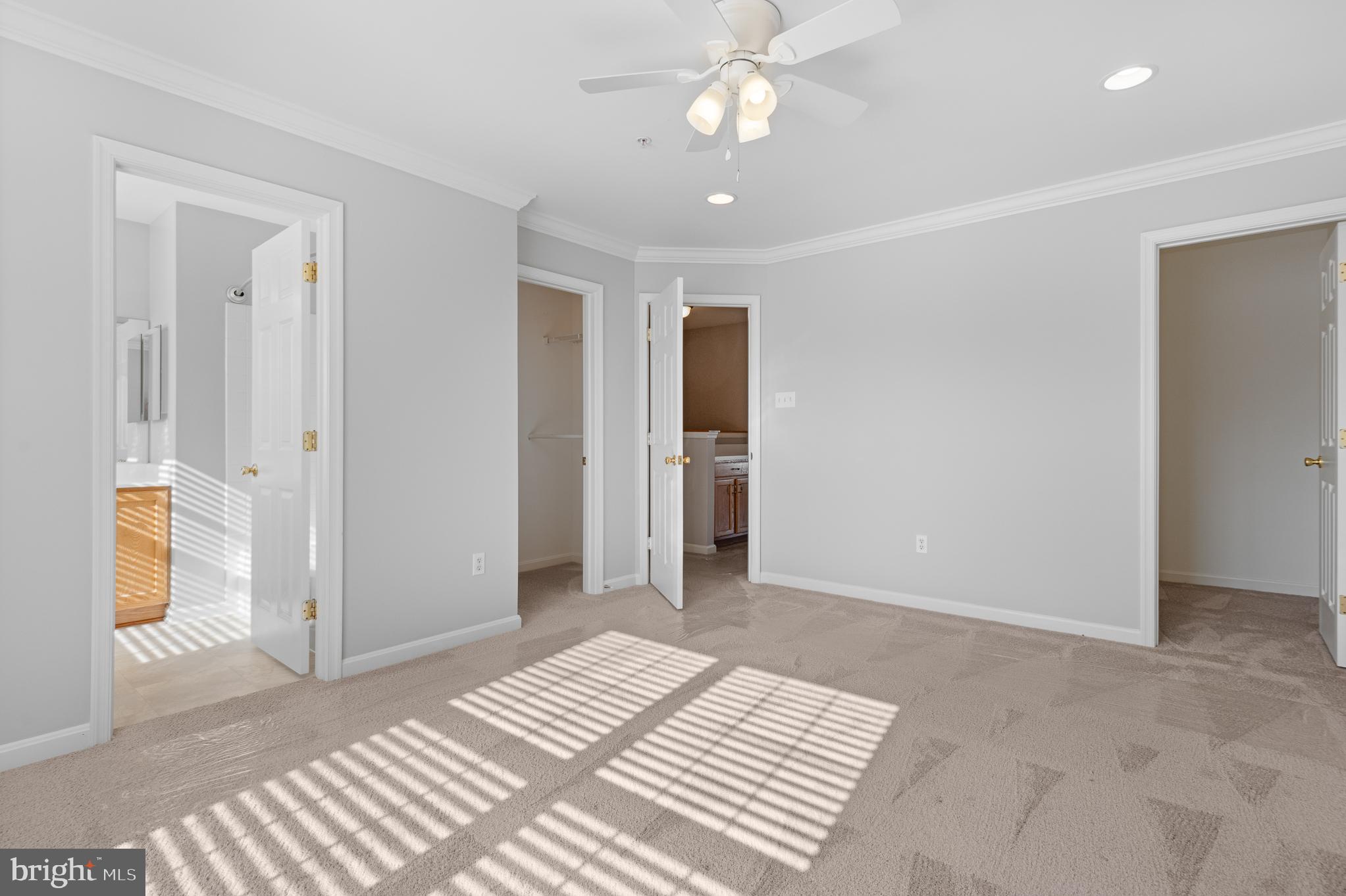 511 Ellison Court Frederick, MD 21703 - Photo 41 of 79 a view of a room with a ceiling fan and entryway