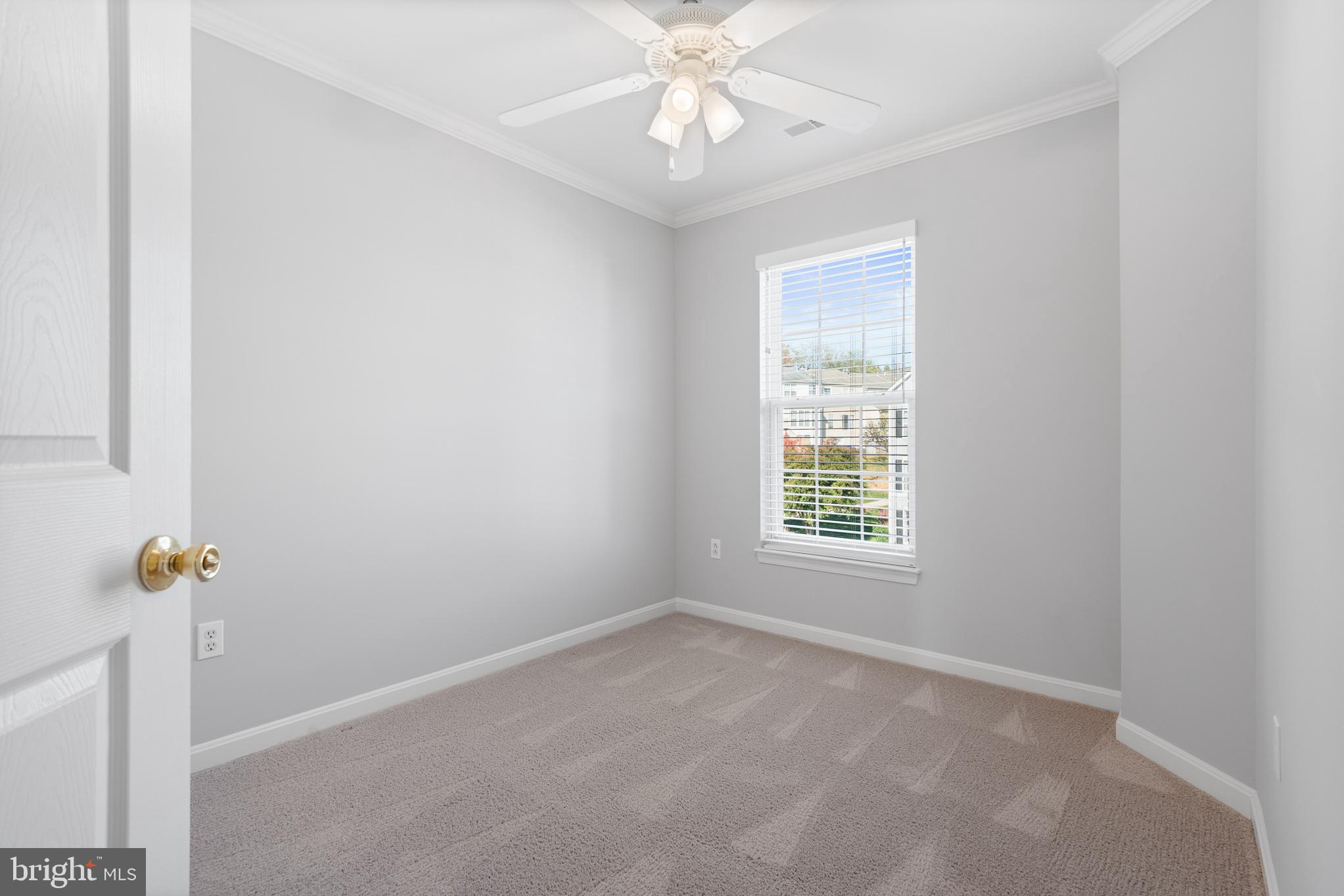 511 Ellison Court Frederick, MD 21703 - Photo 58 of 79 a view of an empty room with a window