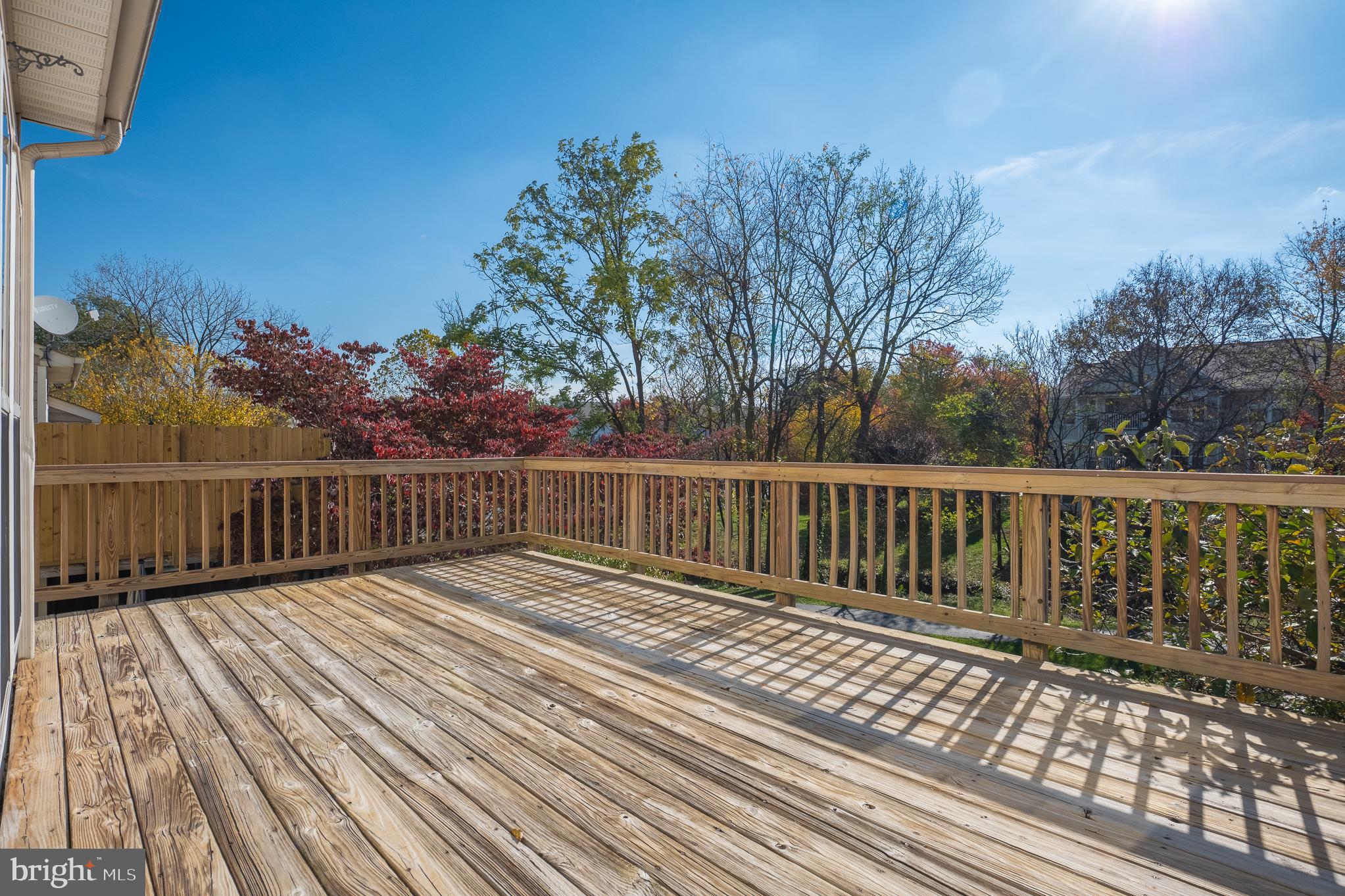 511 Ellison Court Frederick, MD 21703 - Photo 73 of 79 a view of deck with wooden floor and fence with a bench
