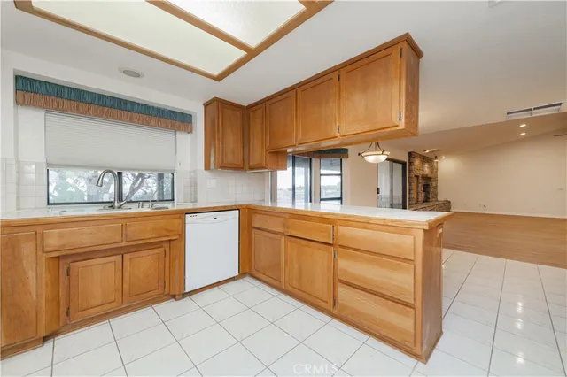 a large spacious bathroom with a large tub and sink