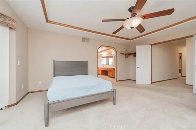 a bathroom with a sink vanity granite and toilet