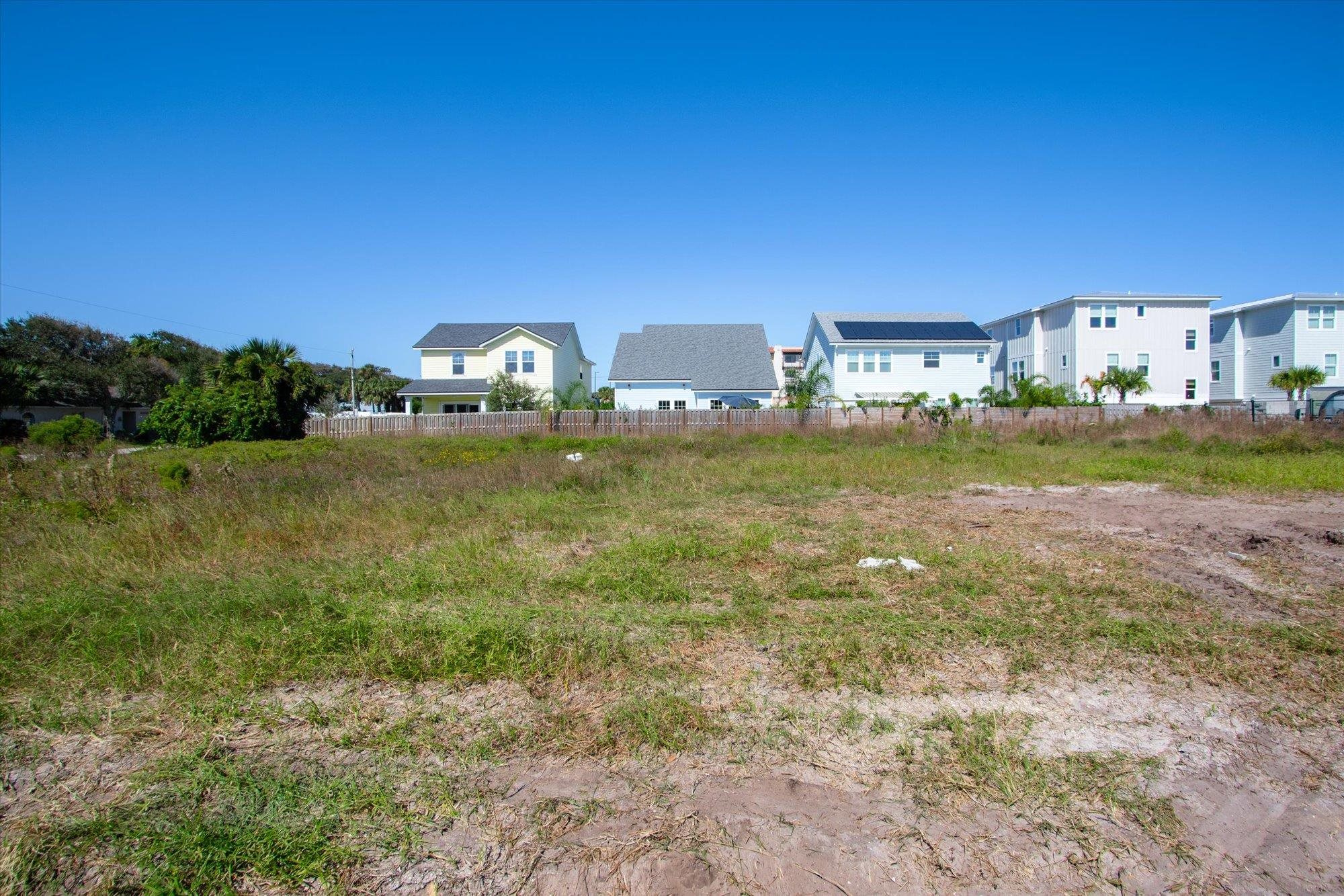 126 4th Street St. Augustine, FL 32080 - Photo 16 of 16 a view of a big yard with a house in the background