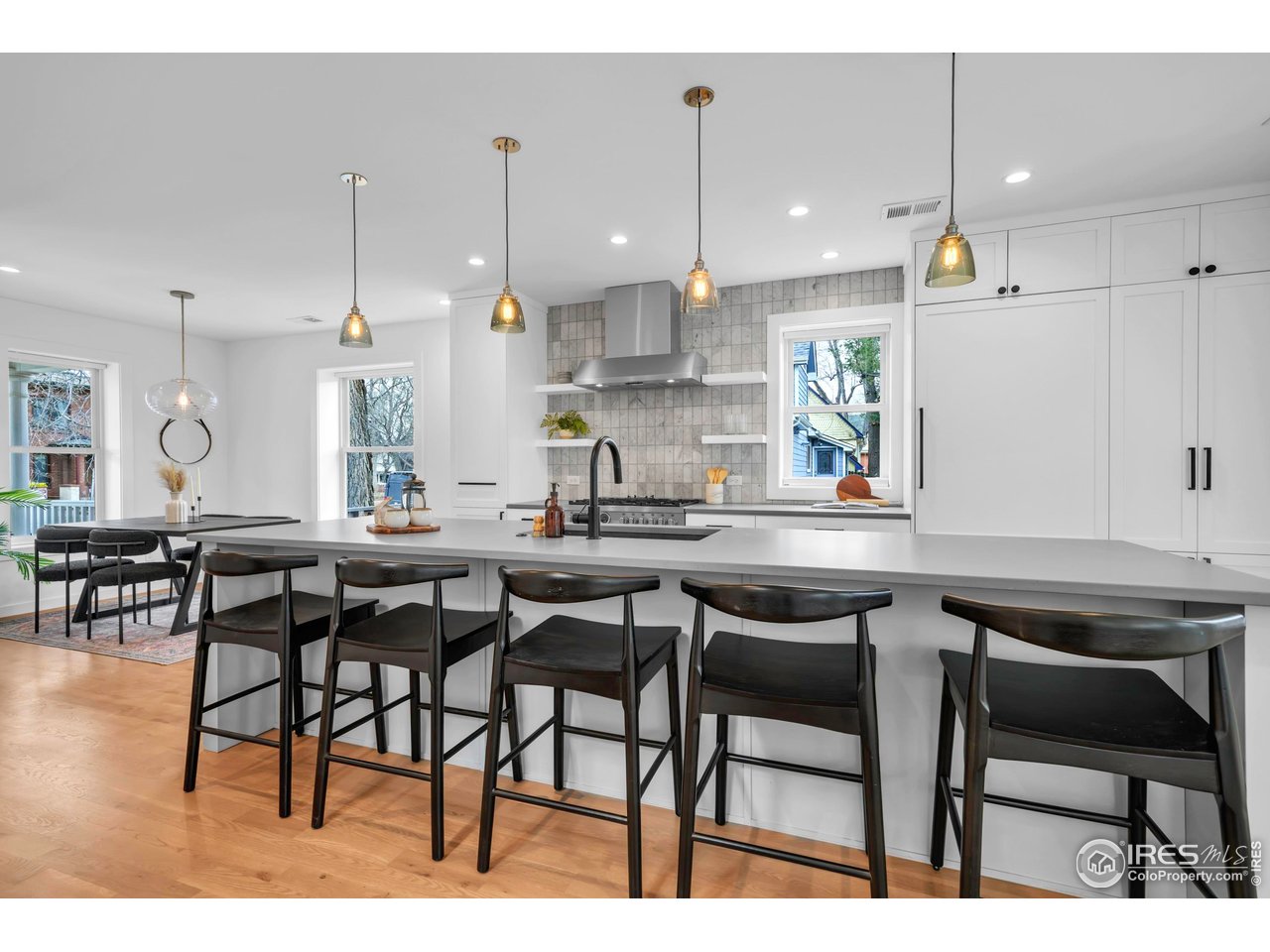 1627 17th Street Boulder, CO 80302 - Photo 4 of 44 Expansive matte-gray quartz topped center island with seating for five