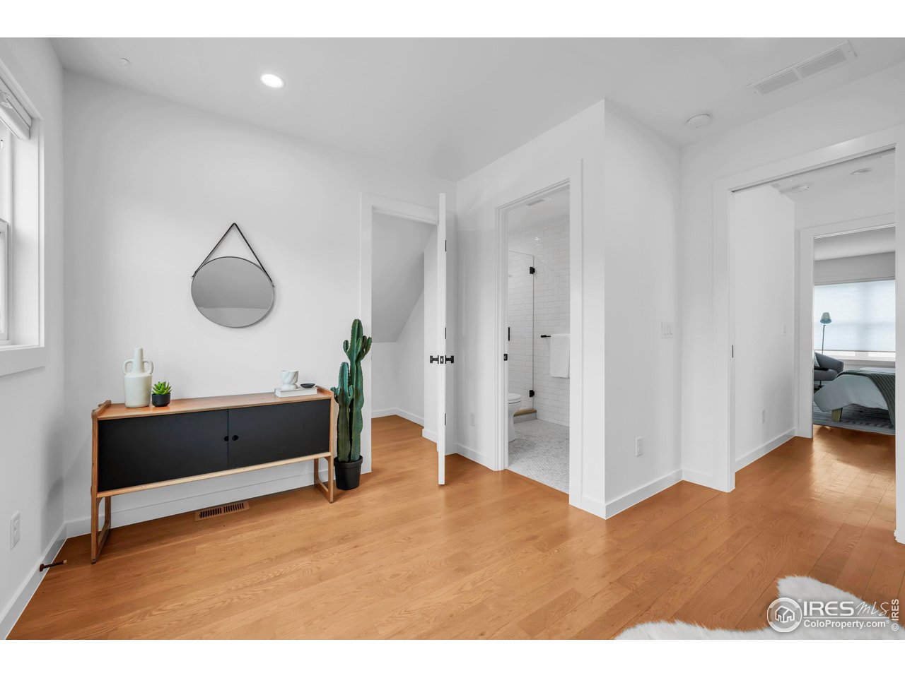 1627 17th Street Boulder, CO 80302 - Photo 9 of 44 Second Bedroom with En-Suite Bathroom and Ample storage and balcony