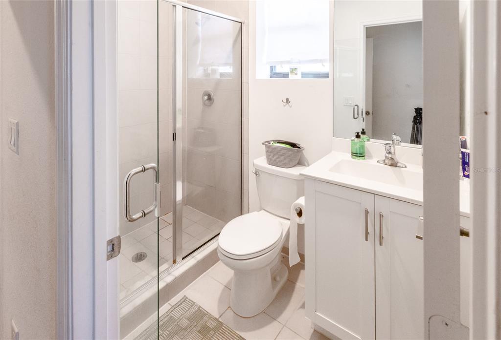 25190 Southwest 107th Avenue Homestead, FL 33032 - Photo 17 of 57 a bathroom with a sink toilet and shower