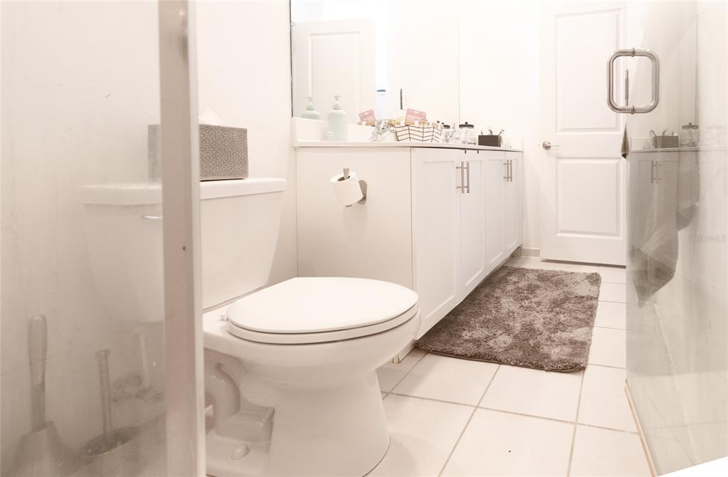 25190 Southwest 107th Avenue Homestead, FL 33032 - Photo 36 of 57 a bathroom with a toilet a sink and shower