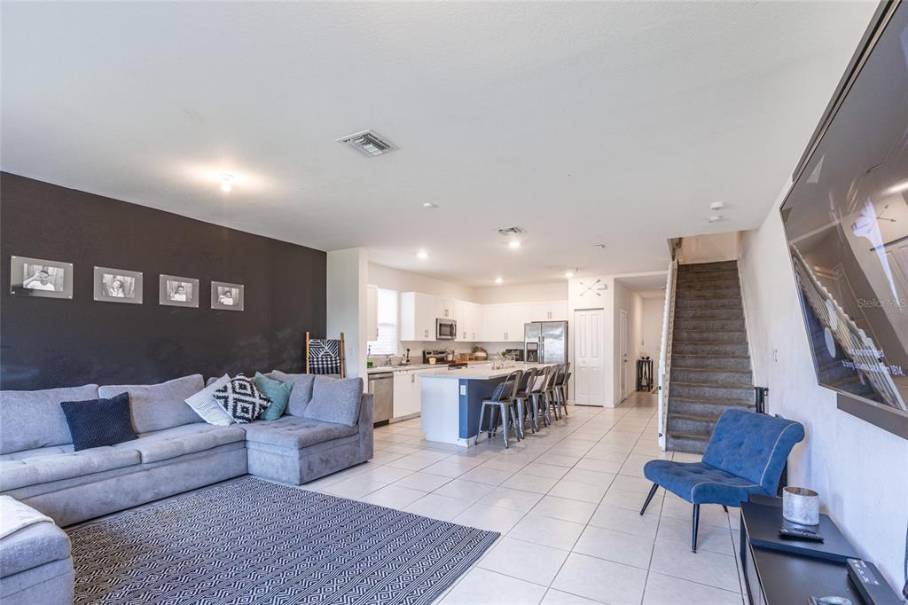 25190 Southwest 107th Avenue Homestead, FL 33032 - Photo 44 of 57 a living room with furniture and view of kitchen