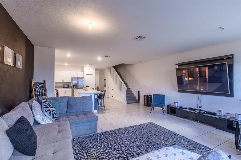 25190 Southwest 107th Avenue Homestead, FL 33032 - Photo 54 of 57 a living room with furniture and a wooden floor
