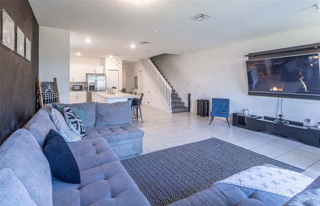 25190 Southwest 107th Avenue Homestead, FL 33032 - Photo 55 of 57 a living room with furniture and wooden floor