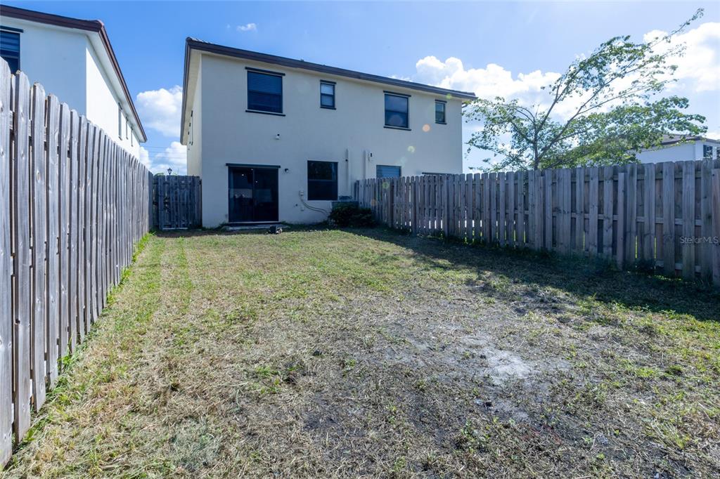 25190 Southwest 107th Avenue Homestead, FL 33032 - Photo 57 of 57 a view of a backyard of the house