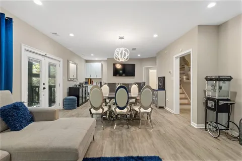 a bathroom with a toilet a sink and a mirror