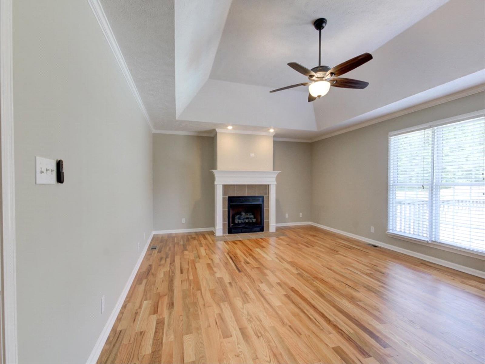 3587 Rabbit Run Trail Clarksville, TN 37043 - Photo 4 of 30 a view of a livingroom with a chandelier fan and windows