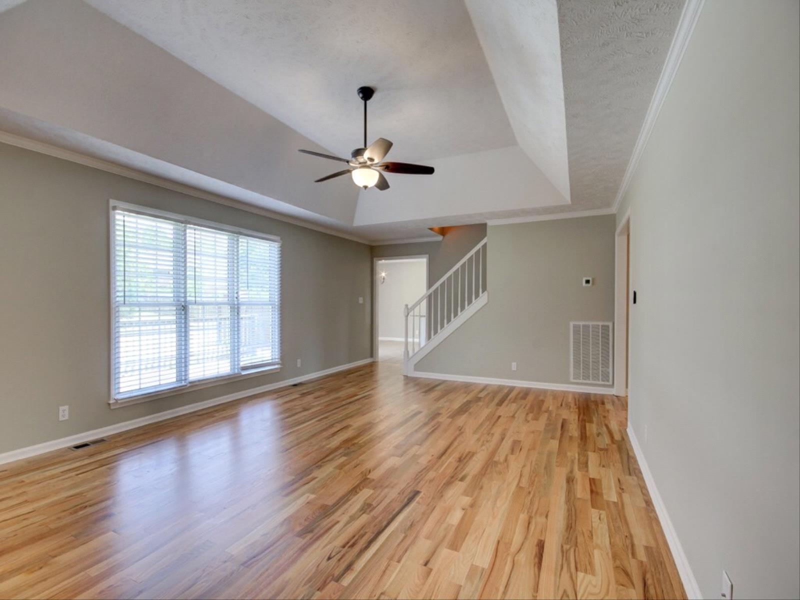 3587 Rabbit Run Trail Clarksville, TN 37043 - Photo 5 of 30 wooden floor in an empty room with a window