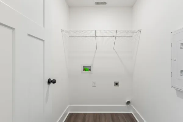 a view of small space with empty racks on the wall