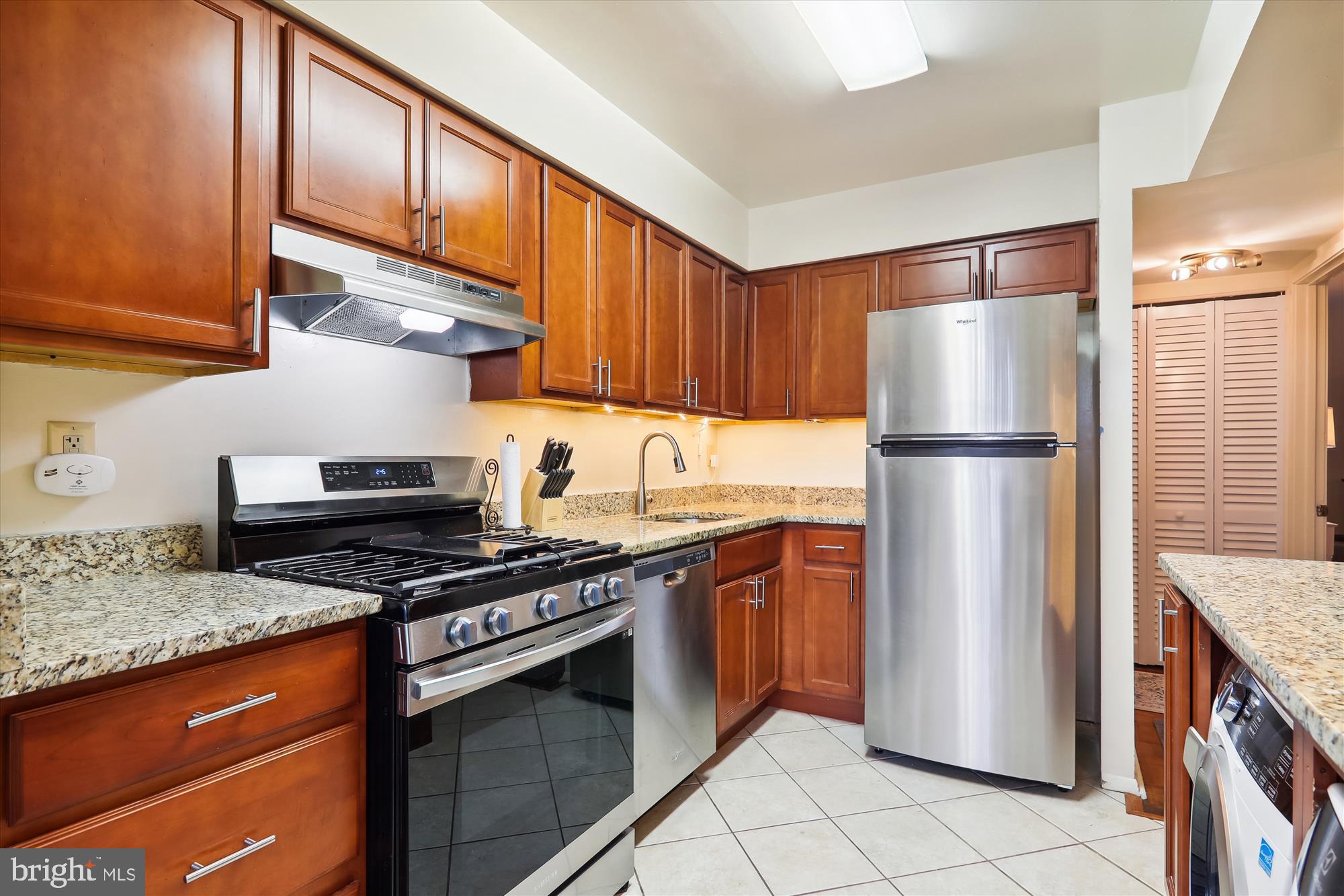 2105 Walsh View Terrace, Unit 15303 Silver Spring, MD 20902 - Photo 3 of 41 Renovated Kitchen with Granite & Stainless!