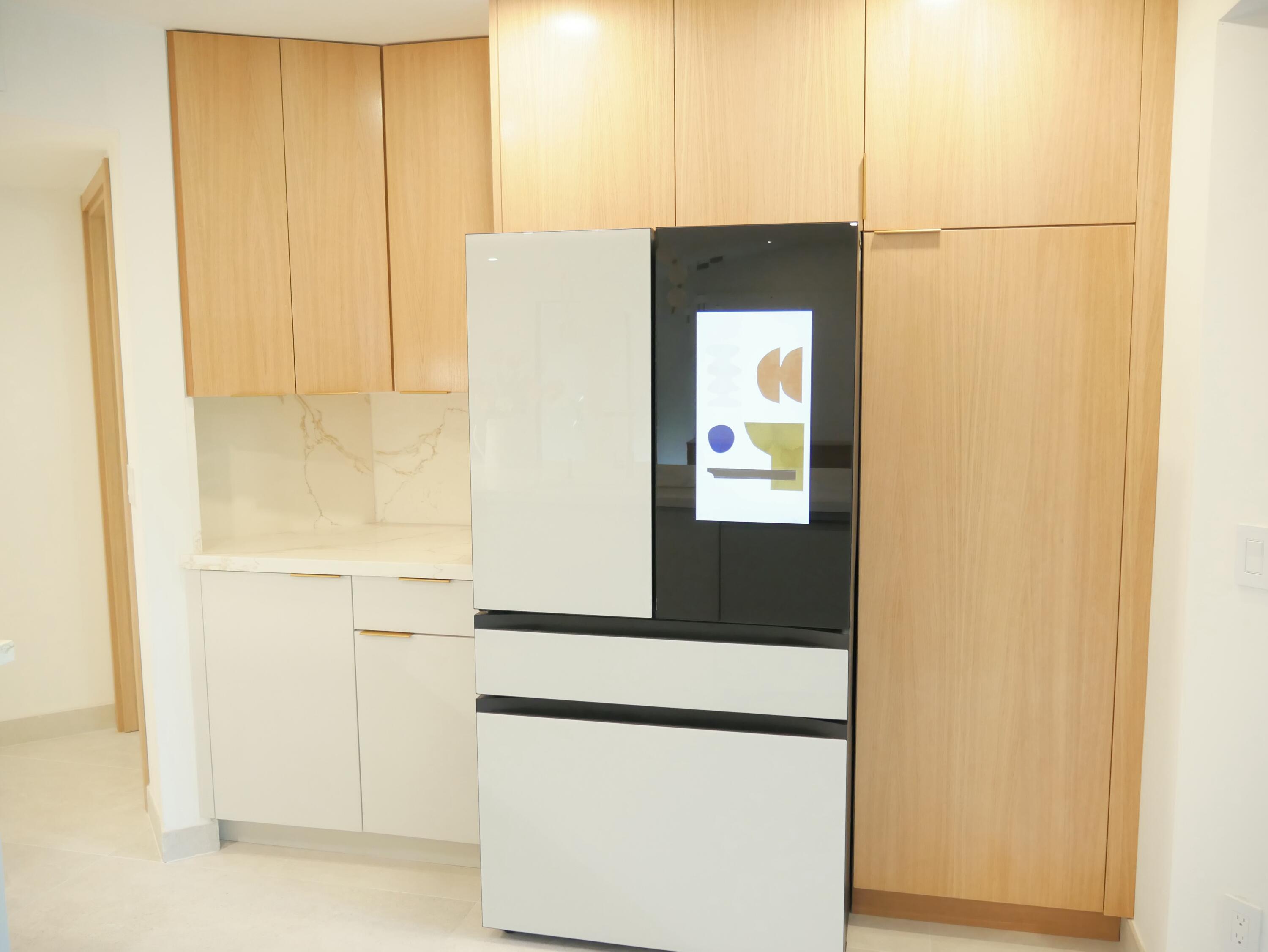 5630 Coach House Circle, Unit D Boca Raton, FL 33486 - Photo 9 of 26 a utility room with washer and dryer