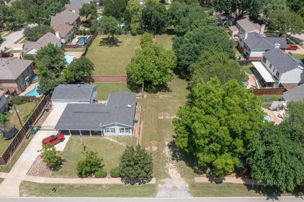 1000 Hughes Road Grapevine, TX 76051 - Photo 12 of 15 an aerial view of a house with outdoor space and lake view