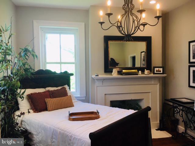 74 Waterloo Street Warrenton, VA 20186 - Photo 11 of 19 a living room with furniture and a fireplace