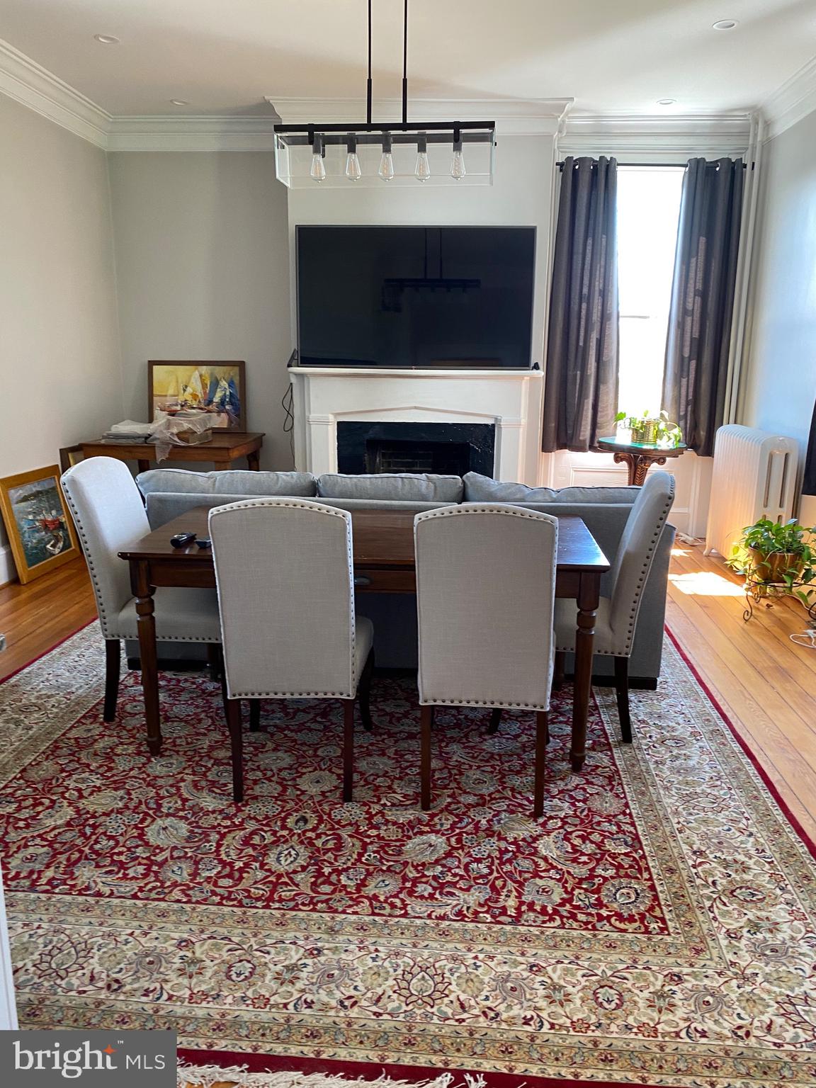 74 Waterloo Street Warrenton, VA 20186 - Photo 12 of 19 a living room with furniture a fireplace and a table