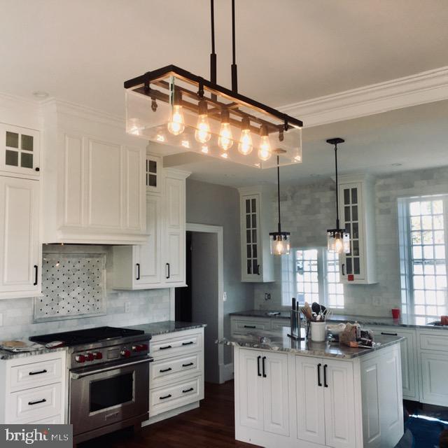 74 Waterloo Street Warrenton, VA 20186 - Photo 3 of 19 a kitchen with a sink stove and cabinets