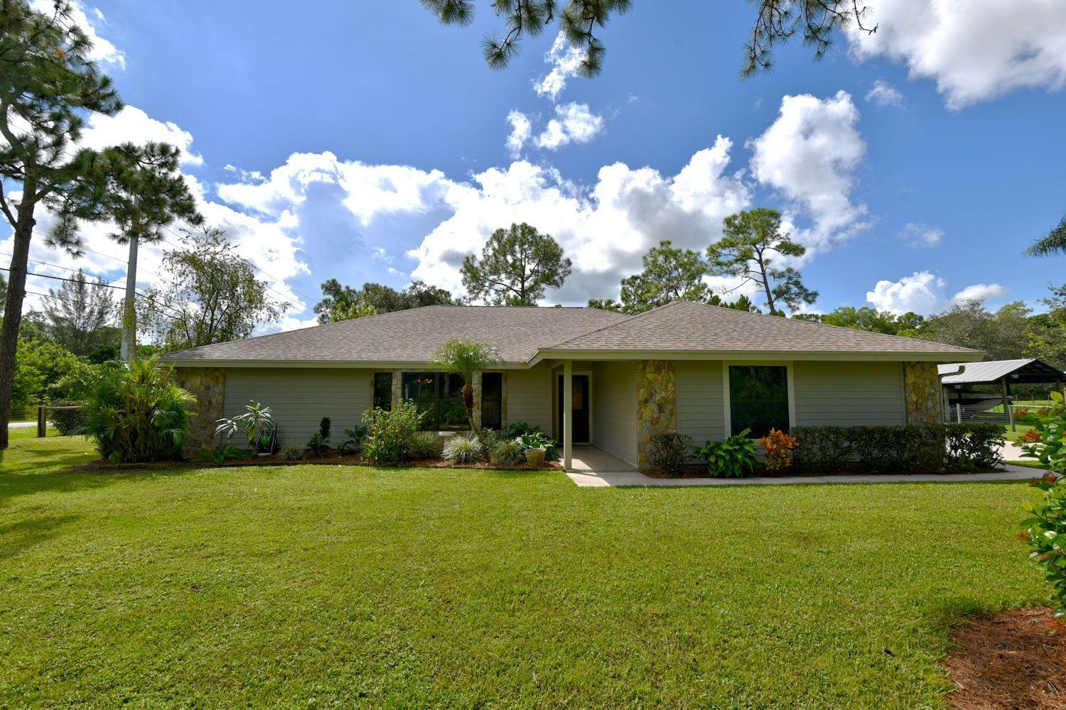 13028 165th Road North Jupiter, FL 33478 - Photo 1 of 36 165Front