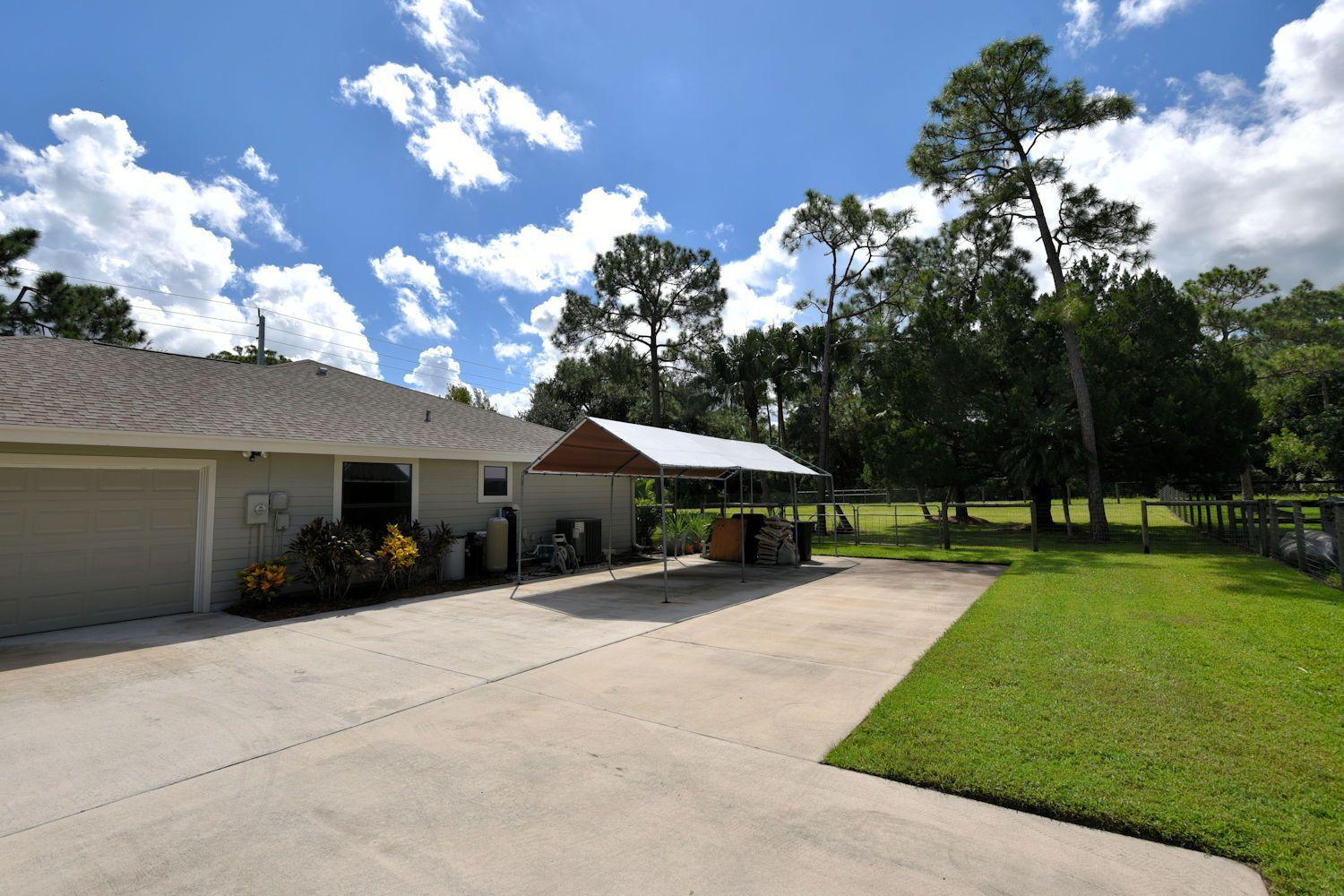 13028 165th Road North Jupiter, FL 33478 - Photo 21 of 36 165Driveway