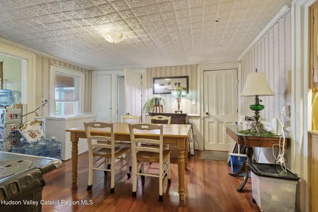 a view of a swimming pool with a porch