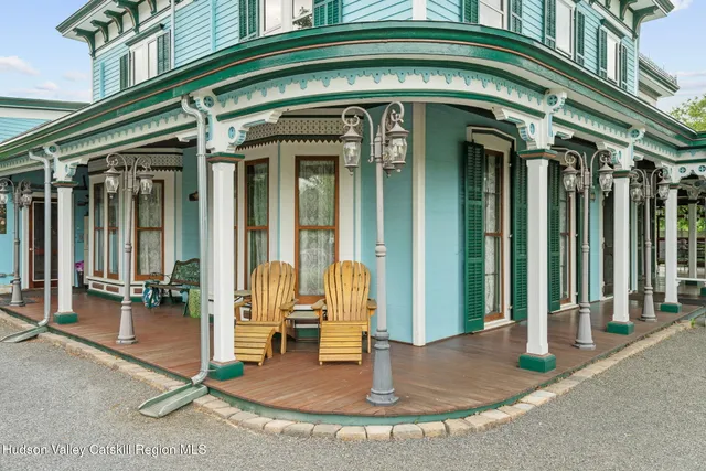 a kitchen with a sink toilet and shower