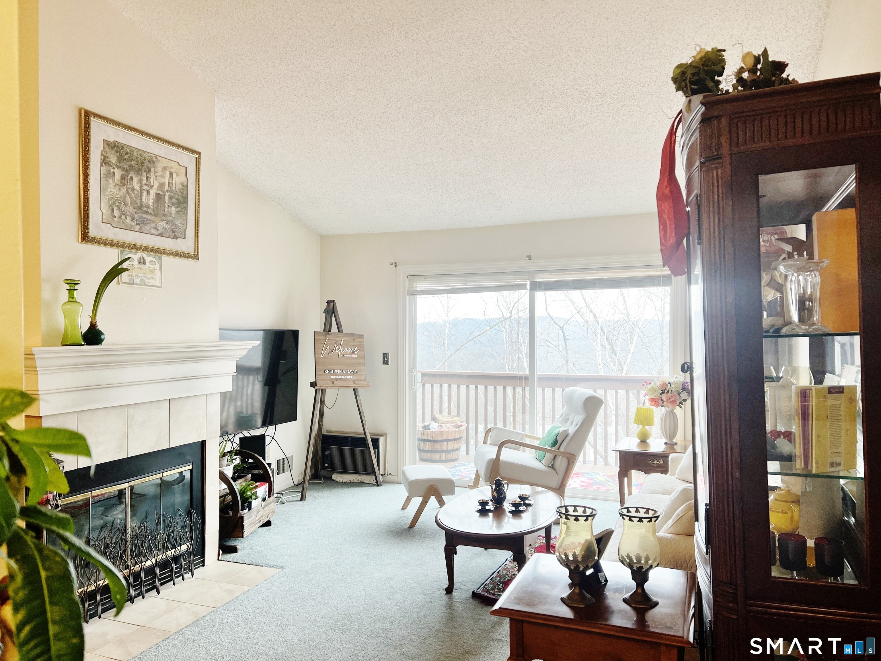 91 Rockledge Loop, Unit 91 Torrington, CT 06790 - Photo 14 of 24 * Slider to the outside raised deck to enjoy the year-round views