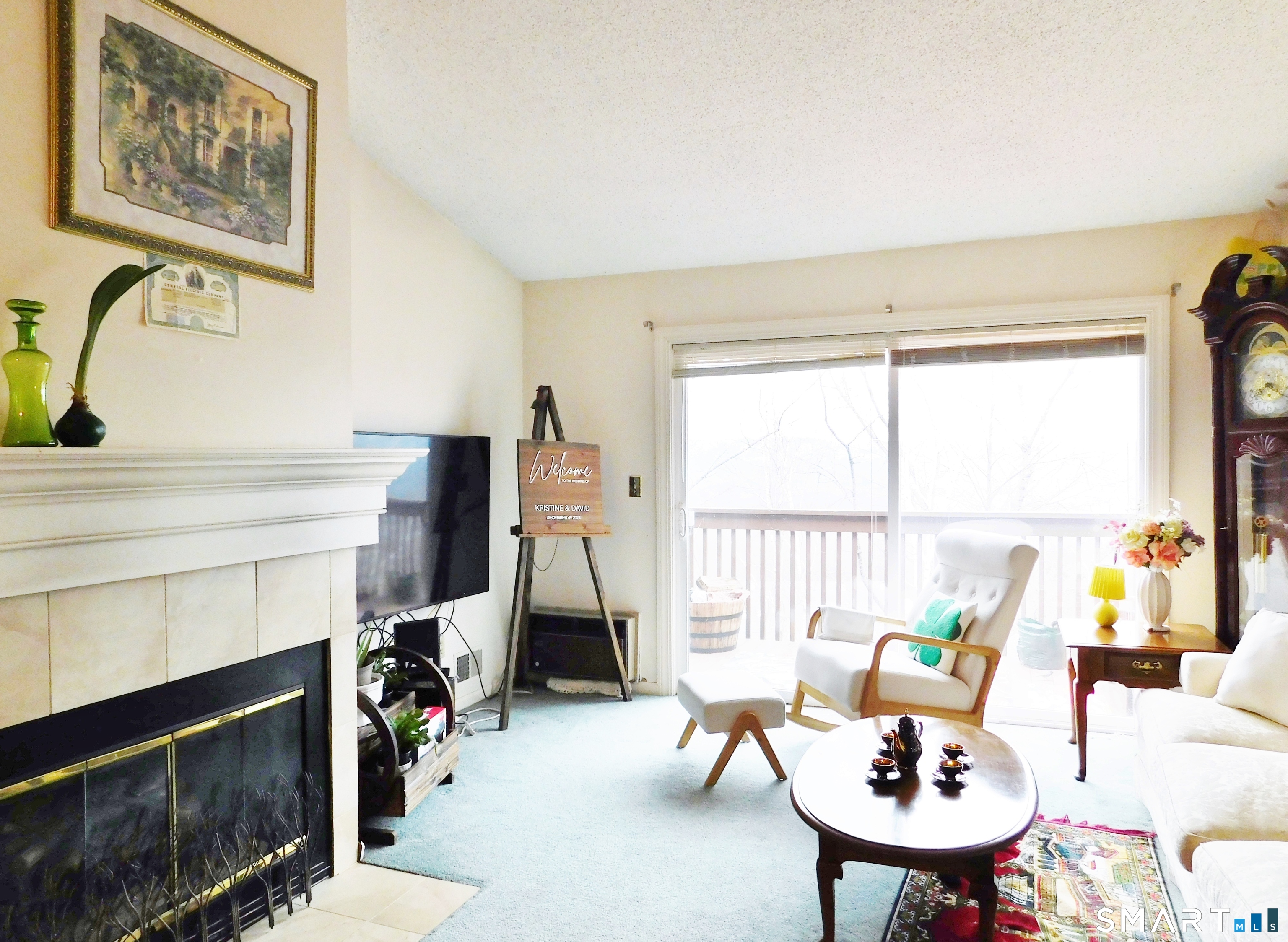 91 Rockledge Loop, Unit 91 Torrington, CT 06790 - Photo 15 of 24 * Living Room open to the Dining Area with Fireplace