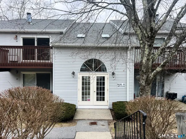 a kitchen with a stove a refrigerator and a sink