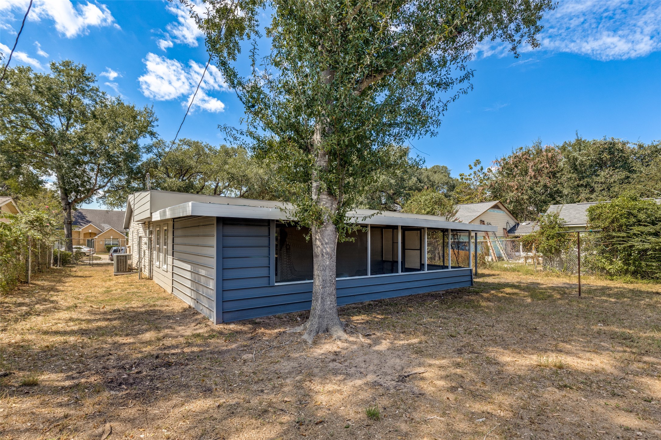 200 Pine Street Prairie View, TX 77446 - Photo 25 of 25 a view of a house with a yard