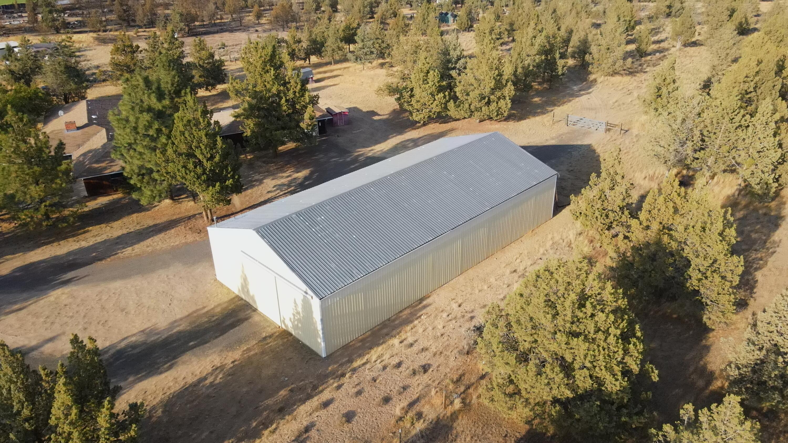 6302 Stillman Road Powell Butte, OR 97753 - Photo 33 of 39 drone w/big shop