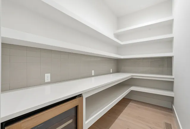 a front view of a building with street view