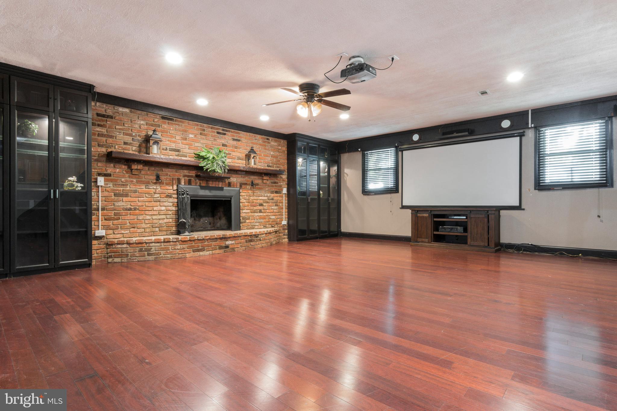 1624 Bay Ridge Road Edgewater, MD 21037 - Photo 8 of 34 Projector and screen conveys
