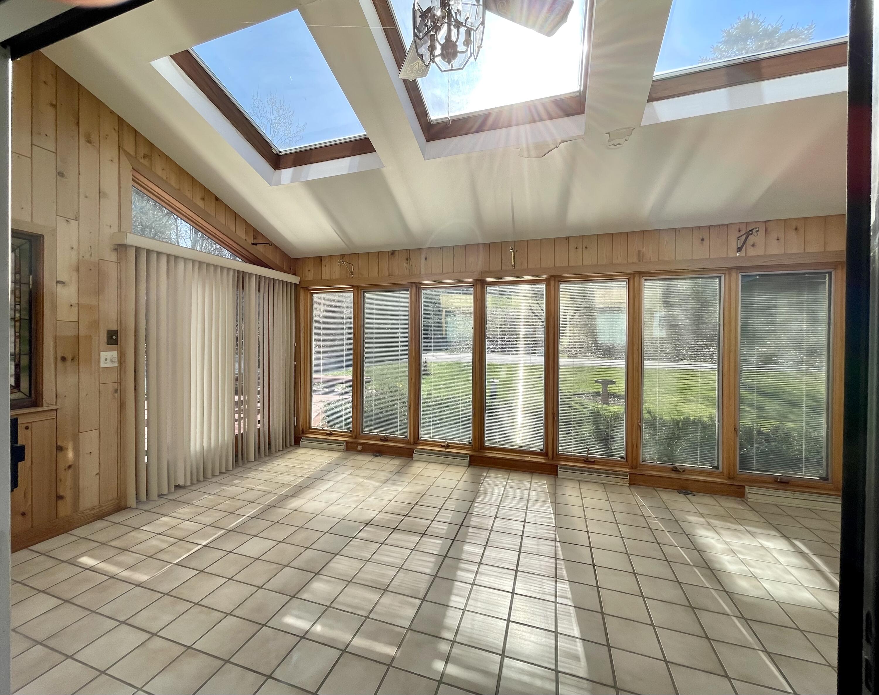 34 29th Fire Road South China, ME 04358 - Photo 16 of 25 Sunroom