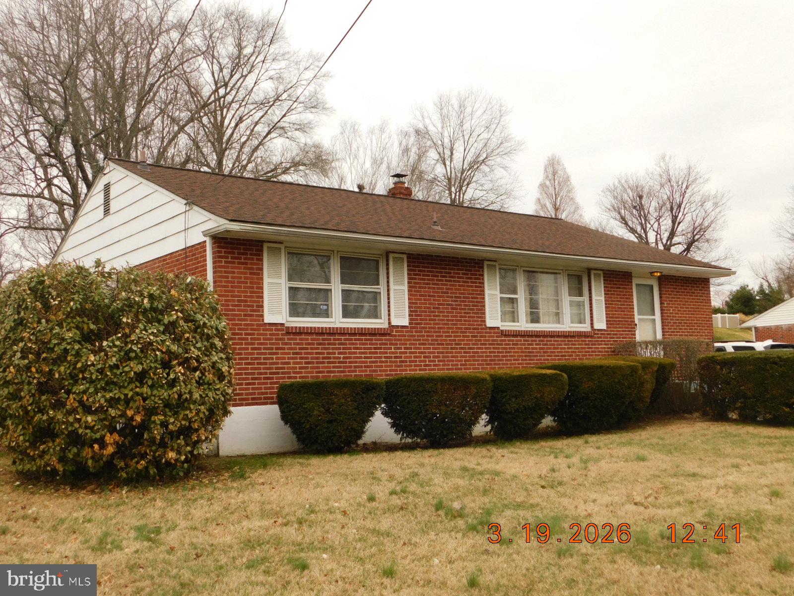 212 Wardel Road Wilmington, DE 19804 - Photo 1 of 1 Charming brick home with lush greenery.