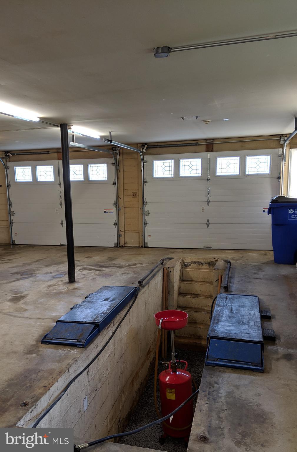1521 Ryan Road Fallston, MD 21047 - Photo 21 of 25 LARGE 2+ CAR GARAGE WITH PIT AND HYDRAULIC LIFT