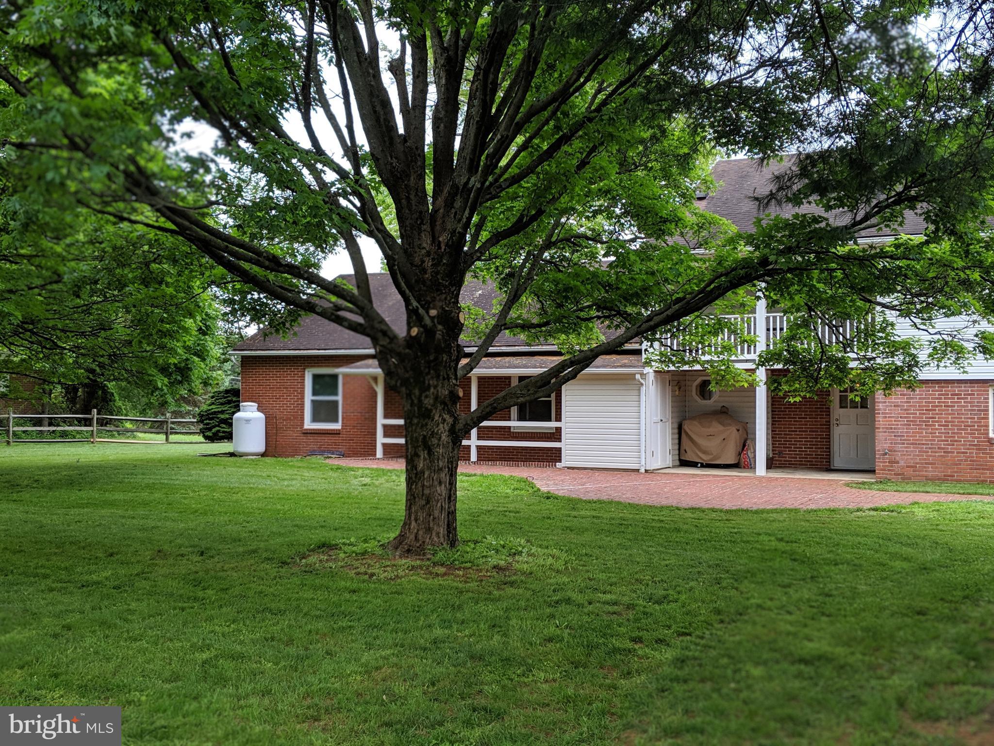 1521 Ryan Road Fallston, MD 21047 - Photo 23 of 25 REAR LAWN WITH PAVER PATIO IDEAL FOR ENTERTAINING