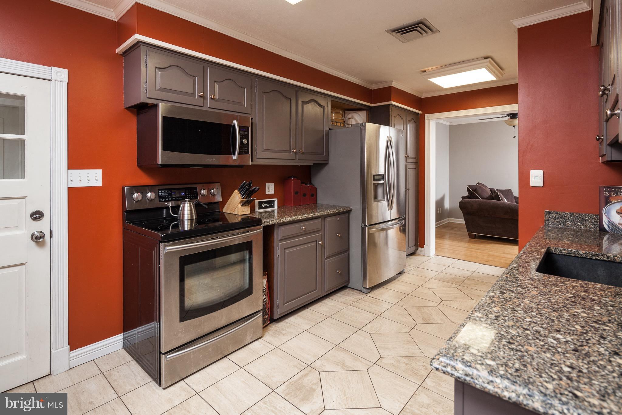 1521 Ryan Road Fallston, MD 21047 - Photo 8 of 25 KITCHEN WITH SS APPLIANCES AND CERAMIC TILED FLOOR